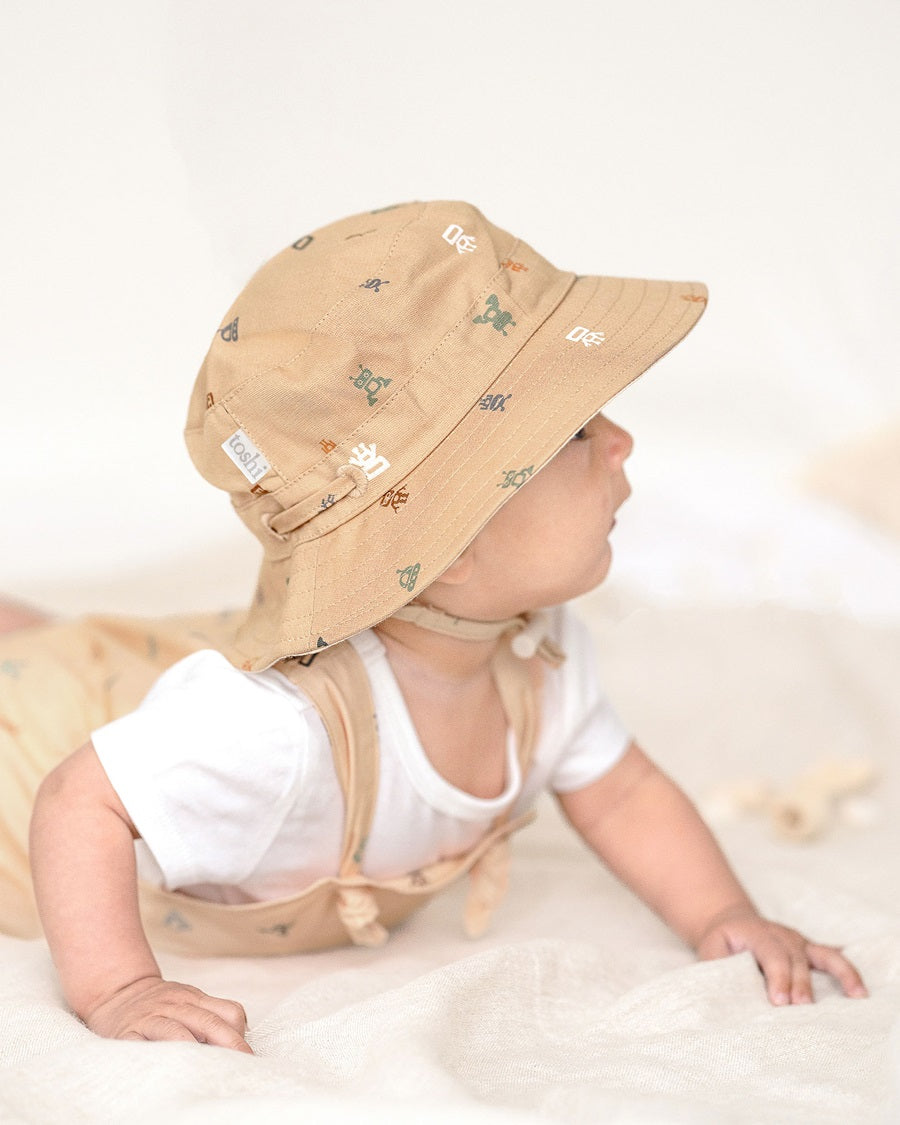 Toshi - Sunhat Folk Cyborg Desert