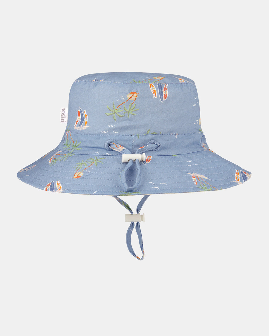 Toshi - Sunhat Odyssey Sunset Island