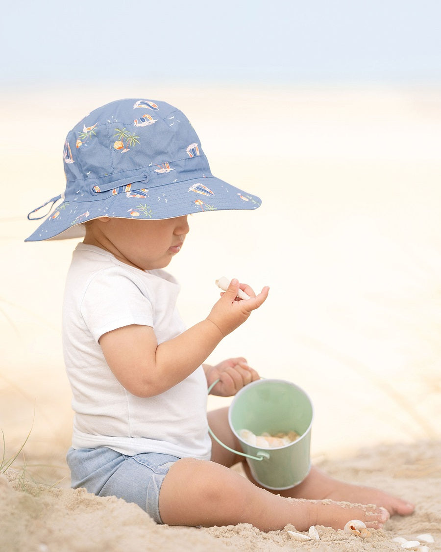 Toshi - Sunhat Odyssey Sunset Island