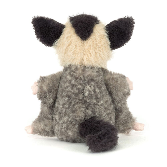 Rear view of a plush toy sugar glider with a fluffy tail on a white background.