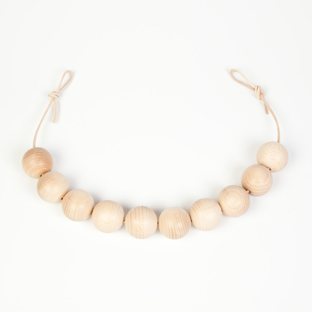 Grapat Natural Garland wooden balls on leather
